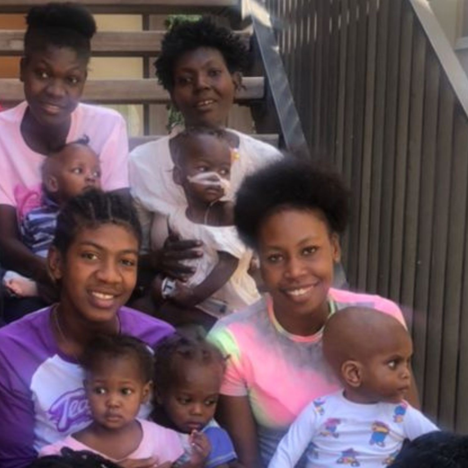Group of mothers and children on a stairway